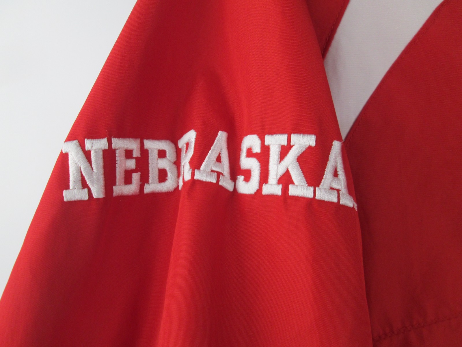 SACAI X NIKE Giacca Nike Team Nebraska Huskers uomo L rossa giacca a vento foderata in rete Cornhusker