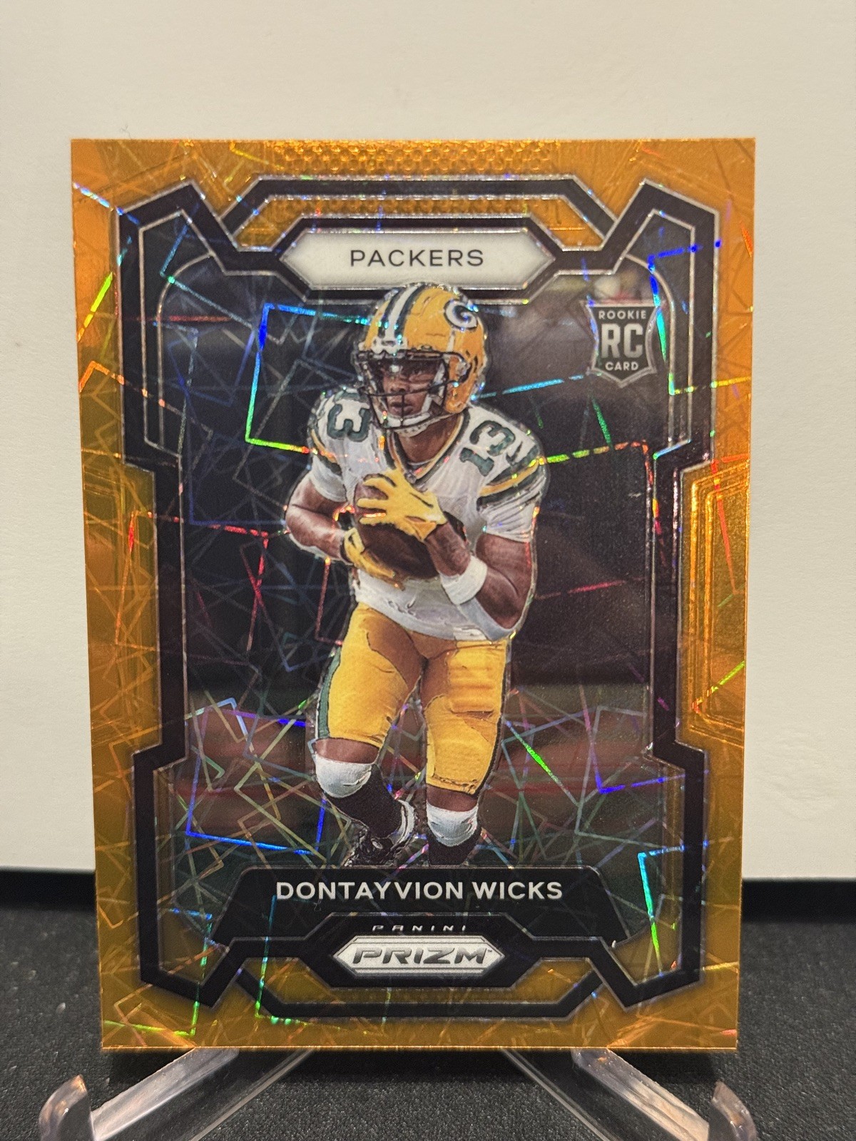 Dontayvion Wicks 2023 Prizm Football Orange Lazer Prizm Rookie #333 NrMt