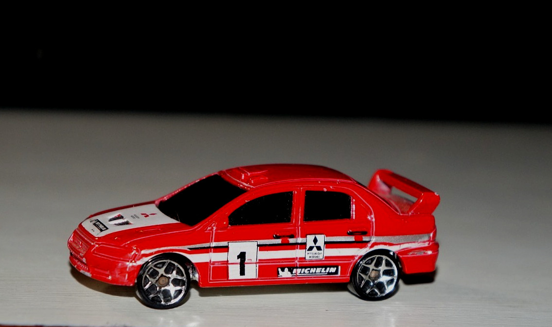 2008 Hot Wheels Track Stars Mitsubishi Lancer Evolution VII Red 1/64
