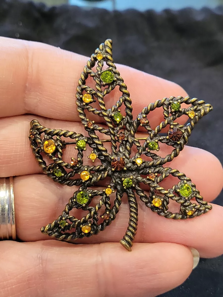 Vintage avon brooches deals