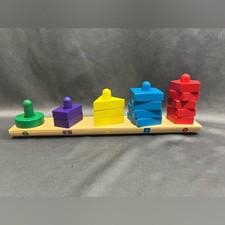 Melissa  Doug Stack and Sort Board - Wooden Toy With 15 Solid Wood Pieces