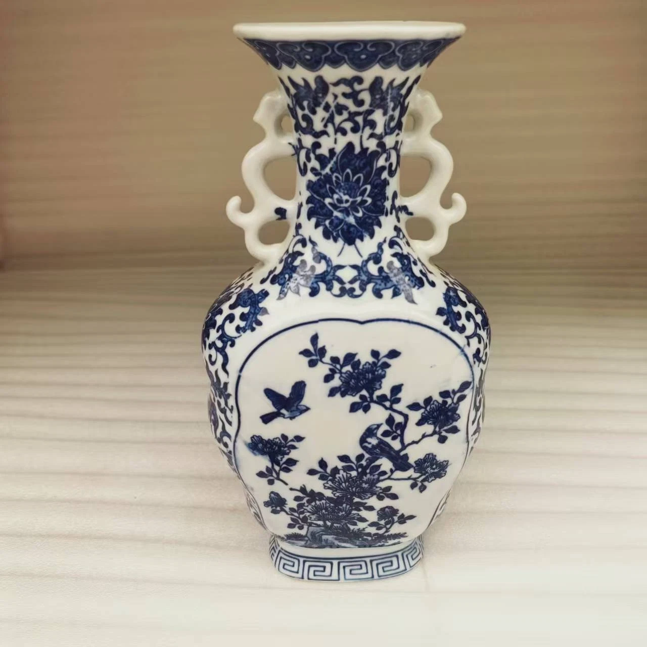 China Old Porcelain Blue and white flower and bird patterned double ear vase
Opens in a new window o