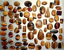 TIGER EYE 1000 CARATS OF CABOCHONS MIXED SHAPES AND SIZES ALL NATURAL