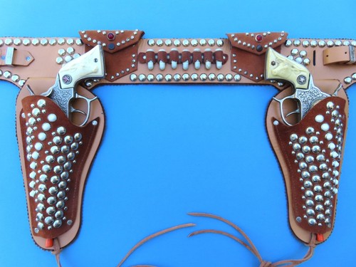 STUNNING RESTORATION OF A KEYSTON BROS. CAP GUN HOLSTER RIG (CAP GUNS NOT INCL.)