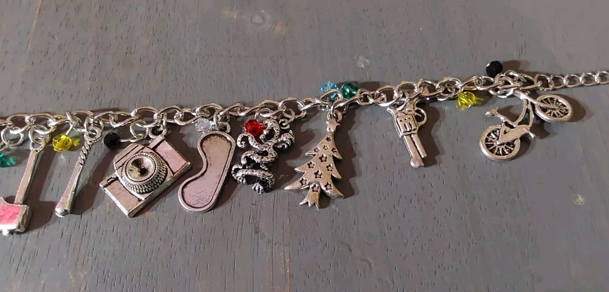 カチューシャ・被り物・帽子 Universal Studios Pewter Charm Bracelet Vintage Universal Studios Florida Silver Tone Charm Bracelet