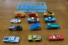 Lot of 12 Vintage Matchbox Cars & Trucks In Plastic Car Holder