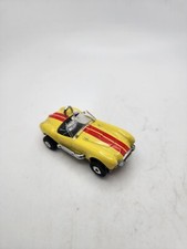 DAYTONA SHELBY COBRA DASH MOTORSPORTS SCREW ON TJET SLOT CAR YELLOW RUNS