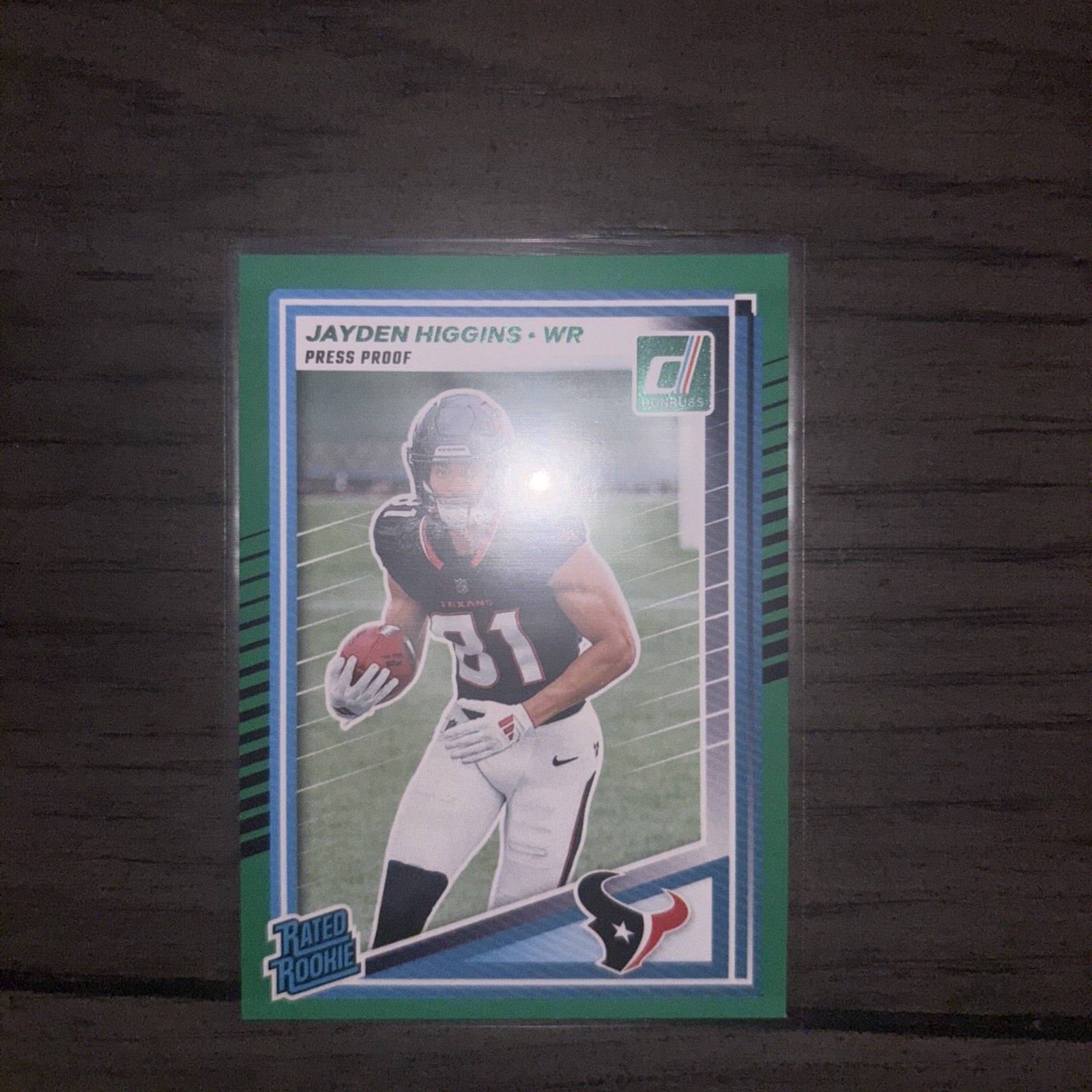 2025 Donruss Football #334 Jayden Higgins Green Press Proof RC - Houston Texans