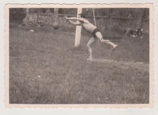 Handsome Athletic Muscular Young Man in Swim Trunks Leaps for the Ball Gay Int
