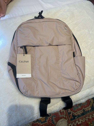 Calpak Luka 15 inch Laptop Backpack in the color Rose Quartz New with Tags