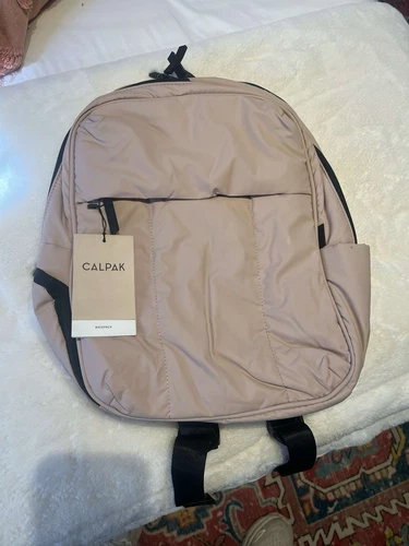 Calpak Luka 15 inch Laptop Backpack in the color Rose Quartz New with Tags