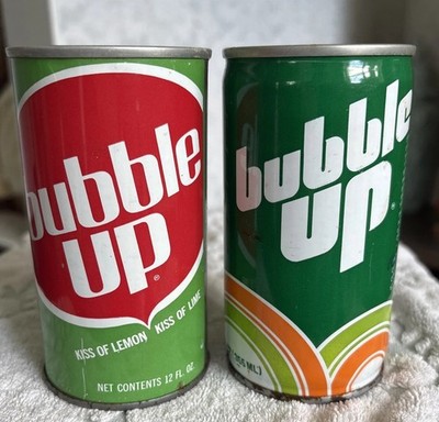 Lot of 2 Vintage Bubble Up Soda Cans 12oz Empty Pull Tab Design Evolution 70 80s