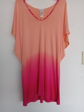 Size M peach  pink beach cover up by Wearabouts. Good condition