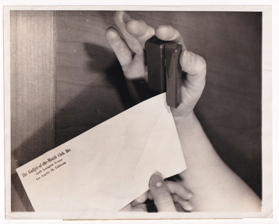 A 1953 photo of a patented 'ingenious' letter opener gadget — a charming slice of mid-century inventor culture.