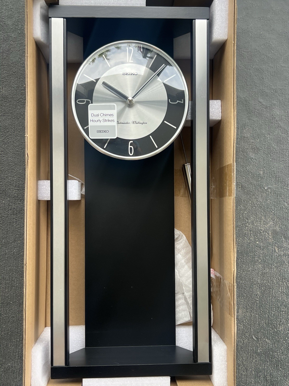 Modern Noir Wall Clock With Pendlum and Dual Chimes