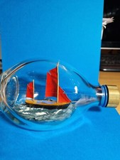 - Small Sailing Boat In A Bottle