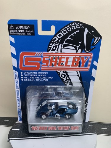 Shelby Collectibles 1965 Cobra Daytona Coupe Blue w/White Stripes #98 1:64 NIP