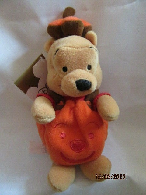 VINTAGE DISNEY WINNIE THE POOH - PUMPKIN 8"" BEAR - MINT CONDITION - RETIRED