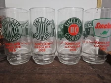 Lot of 4 Vintage Sinclair Gasoline Drinking Glasses "Through The Years" Tumblers
