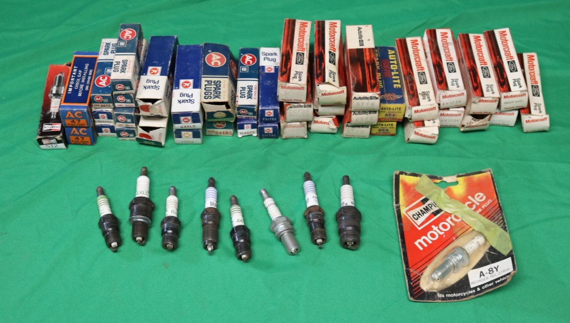 Lot of 49 Assorted NOS Champion , Motorcraft, AC Delco, and Autolite Spark Plugs