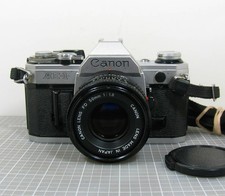 Canon AE-1 35mm SLR Film Camera with the FD 50mm 1.8 Prime Lens Read