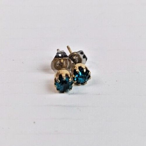 Green rhinestone stud earrings in gold-tone prong setting-image
