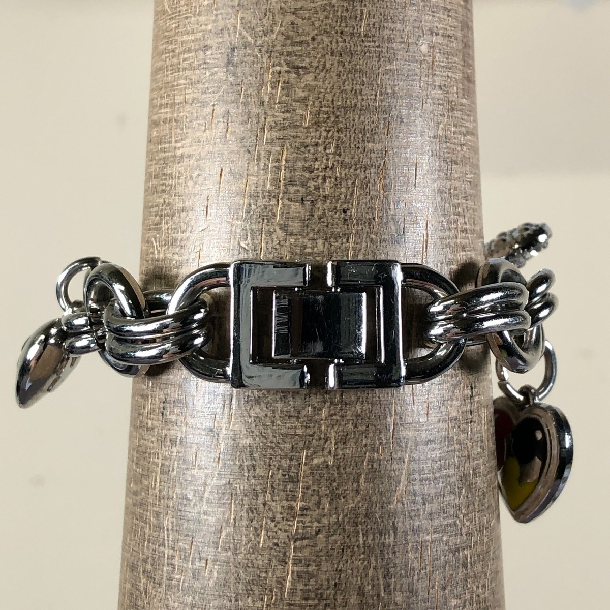 Disney Women's Mk2058 Mickey Mouse Silver-tone Sunray-dial Charm