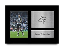 Bruno Guimaraes signiert Newcastle vorgedruck...