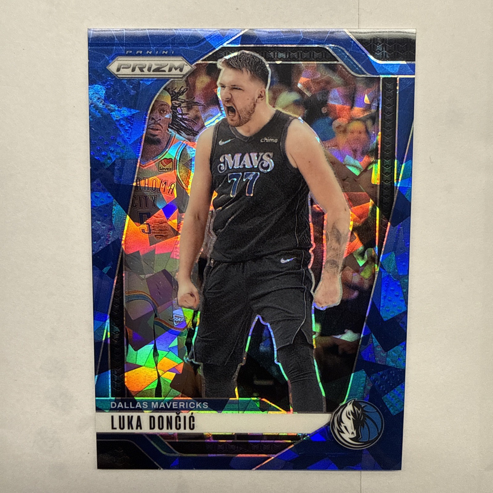 Luka Doncic 2024-25 Panini Prizm Blue Ice 77/125 #89