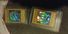 Yugioh cards, blue eyes White dragon  red eyes black dragon. Also dark magician