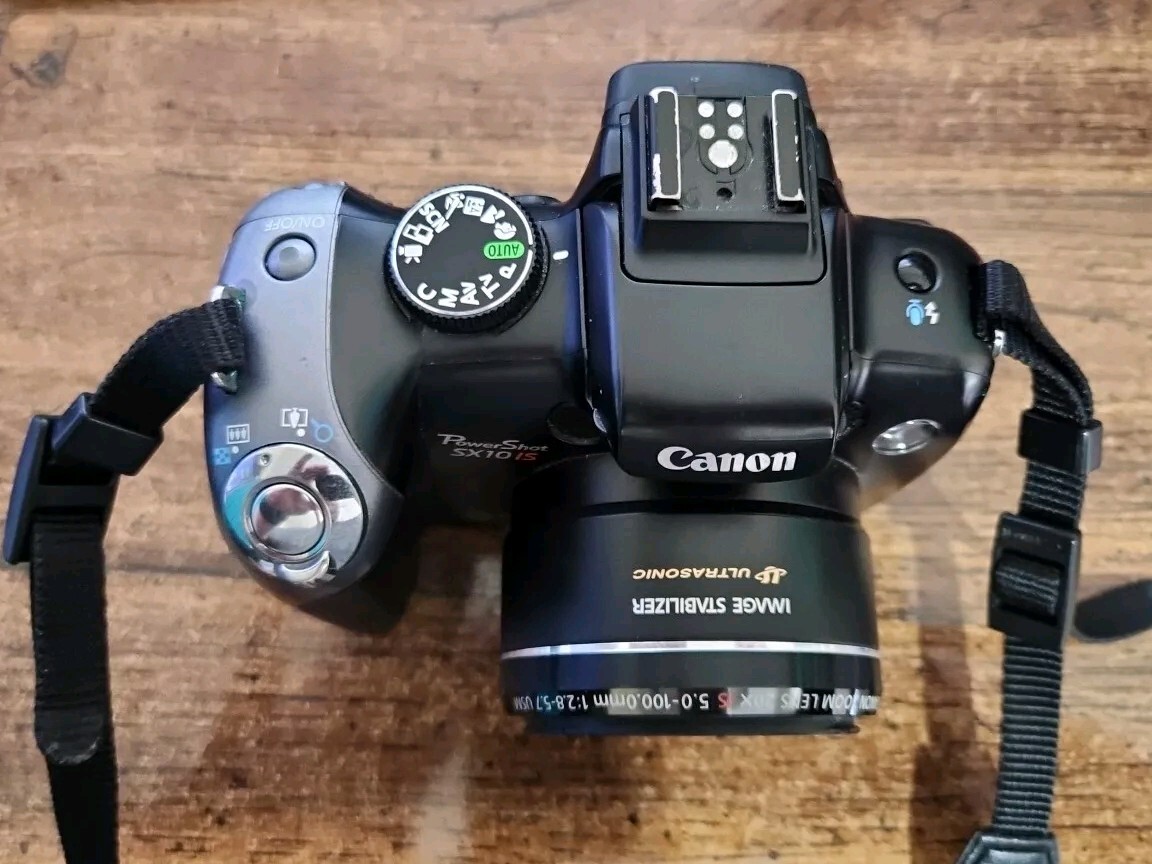 Canon PowerShot SX10 IS 10.0MP Digital Camera - Black w/ 4GB SD