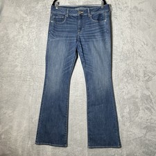 Pantalones de mezclilla American Eagle Kick Boot para mujer 14 X largos azul oscuro elásticos Distress
