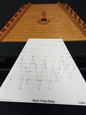 Melody Harp in box includes 10 music sheets of music