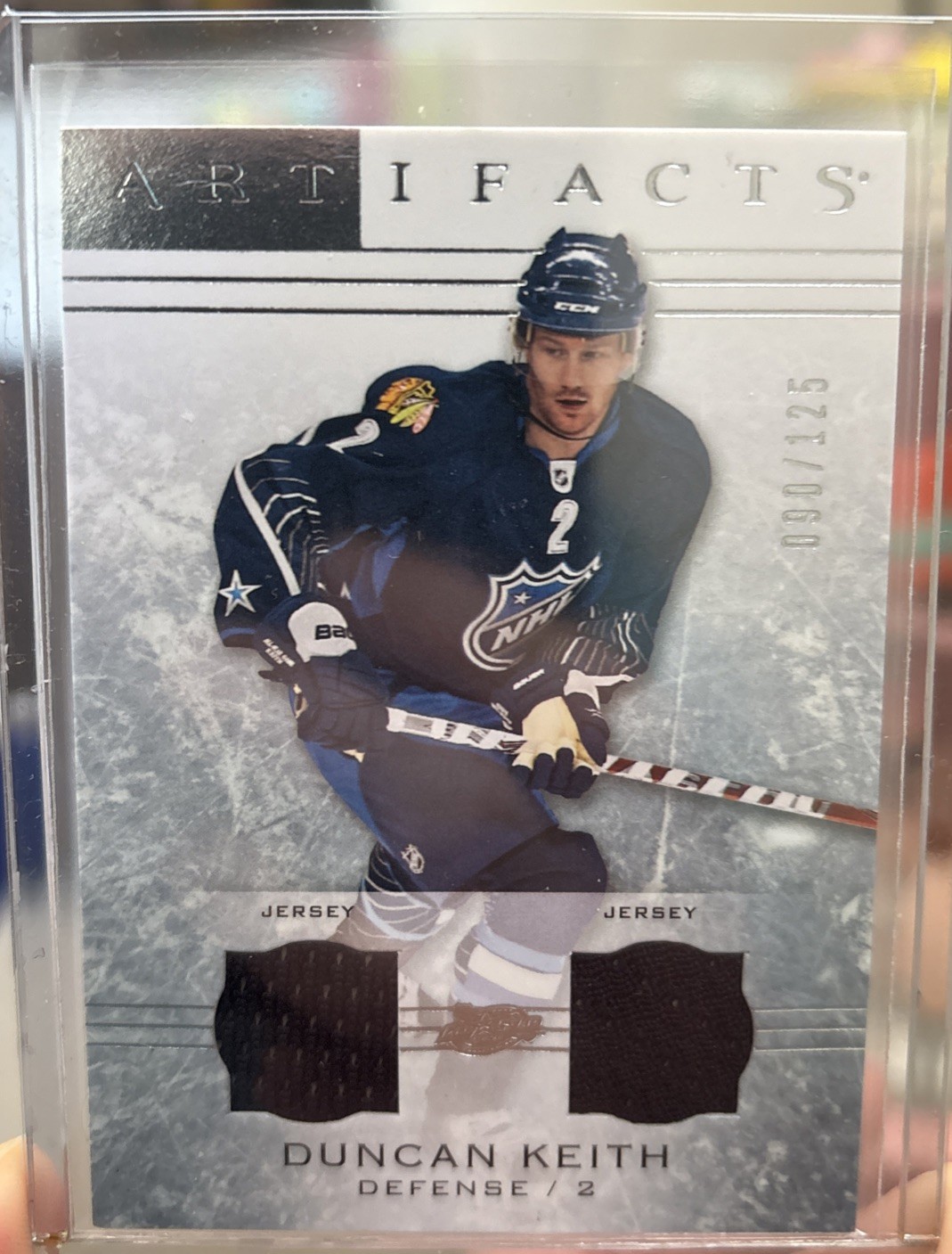 2014-15 Upper Deck Artifacts - Duncan Keith #77 Silver Jersey/Jersey /125 (MEM)