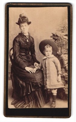 Photograph Mother In Black Tournament Dress With Her Child 