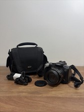 Canon PowerShot SX20 IS 12.1MP 20x Zoom Digit...