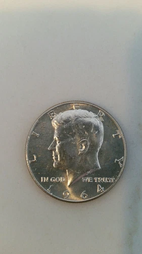 1964-P UNCIRCULATED  KENNEDY HALF DOLLAR.From Original Rolls BU Estate Find