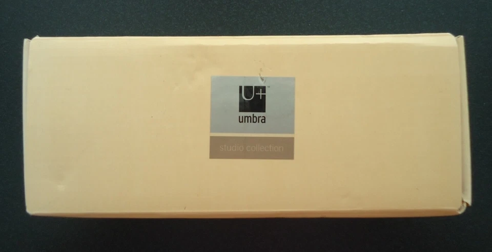 Sacacorchos abridor de barra de vinos plateado U+ Umbra Studio Design Luciano Lorenzatti Foto 2 de 4