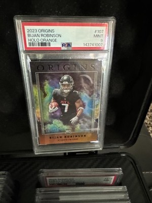 2023 Panini Origins Rookies Bijan Robinson #107 Holo Orange 97/149 (RC) PSA 9