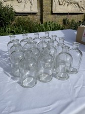 16 Small Clear Glass Bottle Vases 13cm Tall Matching Set for Wedding Table