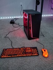 Gaming PC with monitor, keyboard, mouse, and WI-FI adapter
