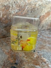 Decorative tooth brush, cotton balls holder with a fluid inside