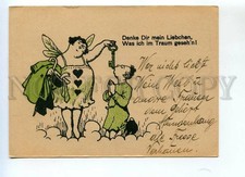 521982 Germany kitsch plump elf girl dominates a man angel at mailbox Vintage