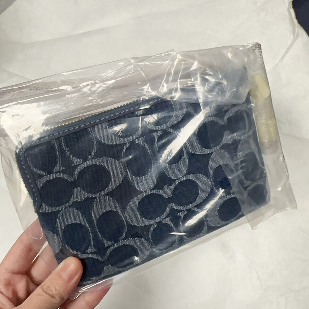 NWT Limited Coach CZ452 Signature Denim Corner Zip Wristlet NWT Limited Coach CZ452 Signature Denim Corner Zip Wristlet