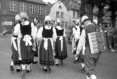 After official opening ceremony this costume group goes their quar- 1955 Photo