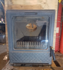 Vintage cast iron fireplace insert,glass front opening door 