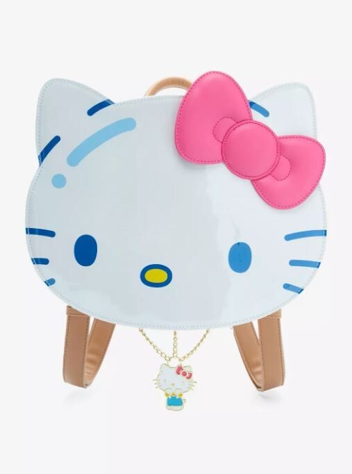 balloons. Interior pocket  adjustable straps.
9 1/2\