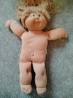 Vintage Cabbage Patch kids 1982 doll  yellow blonde hair head mold 3 green eyes
