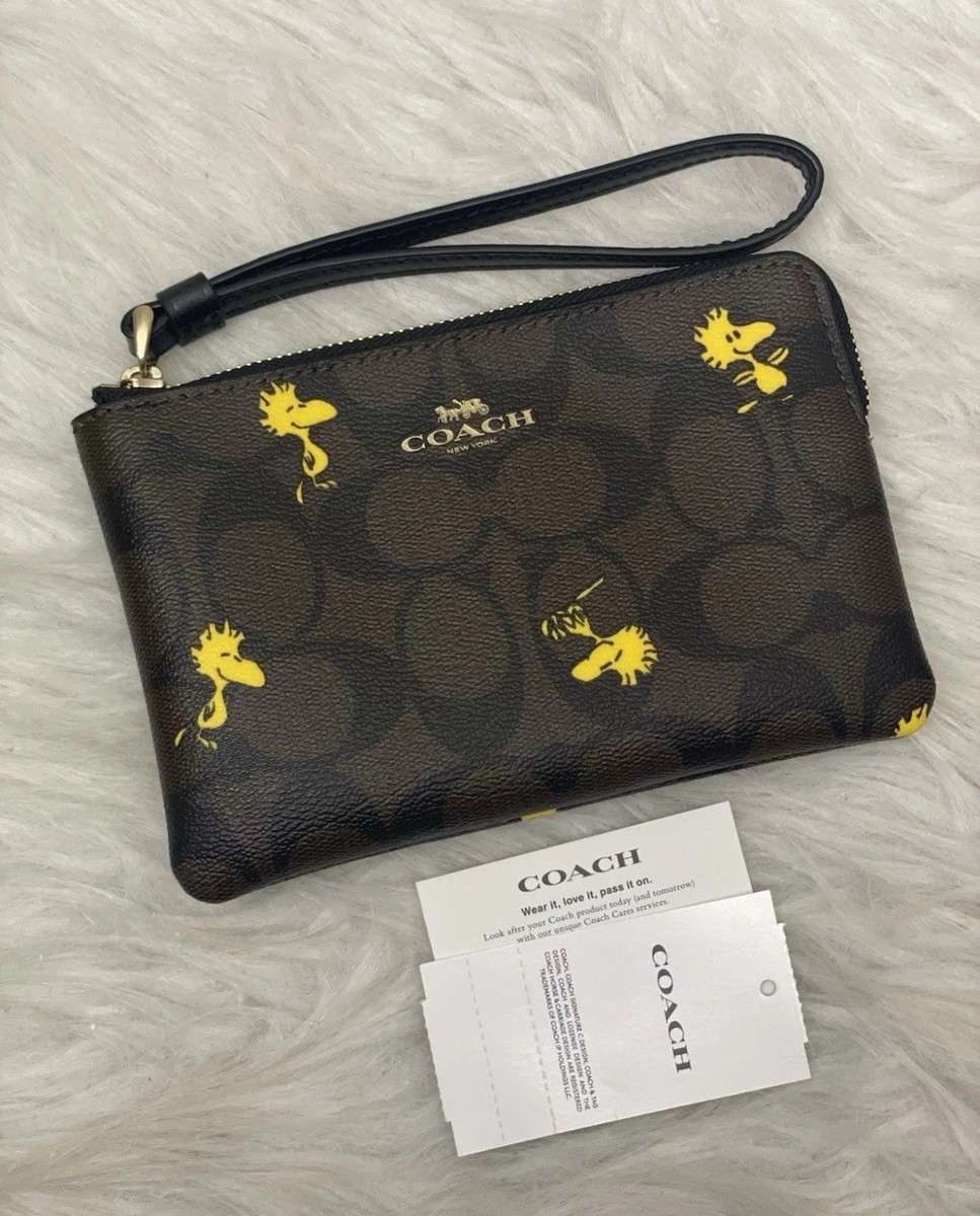Coach X Peanuts Corner Zip Wristlet In Signature Canvas W