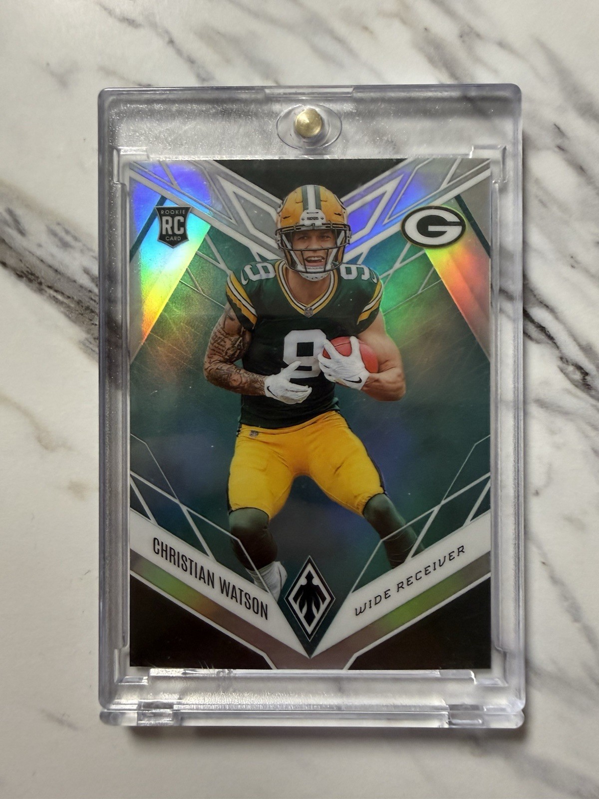 2022 Panini Phoenix - Rookies Christian Watson #119 Teal /150 (RC)